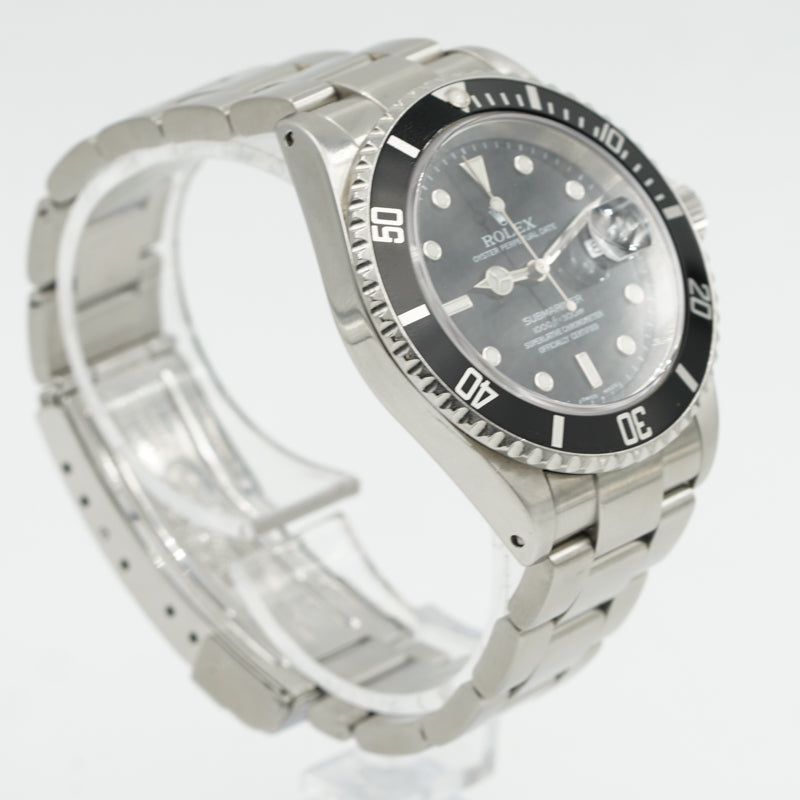 SOLD - 02/02/24 - Rolex Submariner 16610 Stainless Steel Black Dial B&P 2002