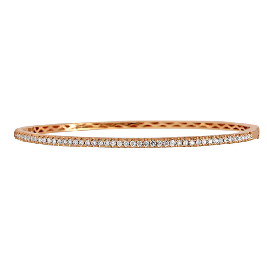 A beautiful, classic diamond bangle that you can add to any stack bracelet look. This gorgeous rose gold bracelet has 0.63ctw diamonds that are G-H in color, SI in clarity glimmering from the top side of the bangle. Pair this striking design with another diamond bracelet from Moyer!