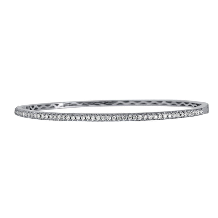 A beautiful, classic diamond bangle that you can add to any stack bracelet look. This gorgeous white gold bracelet has 0.63ctw diamonds that are G-H in color, SI in clarity glimmering from the top side of the bangle. Pair this striking design with another diamond bracelet from Moyer!