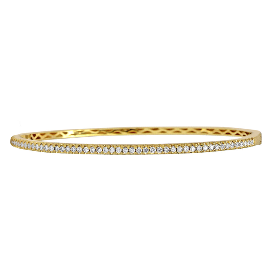 A beautiful, classic diamond bangle that you can add to any stack bracelet look. This gorgeous yellow gold bracelet has 0.63ctw diamonds that are G-H in color, SI in clarity glimmering from the top side of the bangle. Pair this striking design with another diamond bracelet from Moyer!