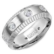 A multi-component CARLEX in white gold with a sandblast finish, eight diamonds and fluted edges. This ring is available in 18K (White, Yellow & Rose) gold & Platinum 950.