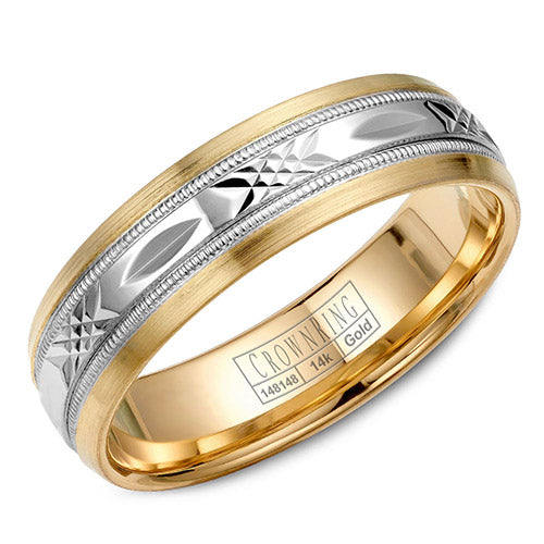 A yellow gold wedding band with a patterned white gold center.