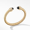 18-karat yellow gold ��� Black onyx, Pav? diamonds, .41 total carat weight,  ��� Bracelet width, 7mm