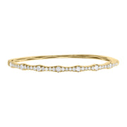 Our 18K yellow gold bracelet design is bound to leave everyone you encounter speechless with desire. The shape of chic. A textured finish gives diamond bangle a fresh, modern dimension. 