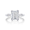 Slim baguettes give a sophisticated twist to this emerald cut diamond engagement ring. With three times the charm and signature Tacori detailing decorating the mounting for sophisticated glitz from all angles; this ring is a keeper.