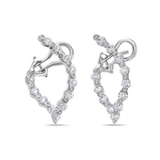 The Diamond Wishbone Delicate Hoop Earrings are a beautiful new design from Charles Krypell. They were created to perfectly flatter the face at all angles with large diamonds shining throughout.For the discerning collector who recognizes purity and quality, the Gold & Diamond Collection is the epitome of brilliance, elegance, and desirability in flawless diamond designs.Details:Material: 18k White GoldDiamonds: Approximately 3.00ctsClosure: Omega hinged back