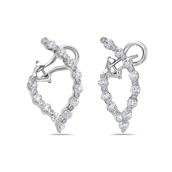 The Diamond Wishbone Delicate Hoop Earrings are a beautiful new design from Charles Krypell. They were created to perfectly flatter the face at all angles with large diamonds shining throughout.For the discerning collector who recognizes purity and quality, the Gold & Diamond Collection is the epitome of brilliance, elegance, and desirability in flawless diamond designs.Details:Material: 18k White GoldDiamonds: Approximately 3.00ctsClosure: Omega hinged back