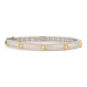 If you are looking for that cool and striking bracelet to enhance your style, this fantastic piece from Jude Francess selection of fine bracelets can be that right piece. From the Mixed Metal Collection, the Mixed Metal Lisse Simple Kite Shaped Bangle with Gold Accents features sterling silver with 18K yellow gold accents and prong set round diamonds with the signature brushed JFJ finish and sterling silver beading.