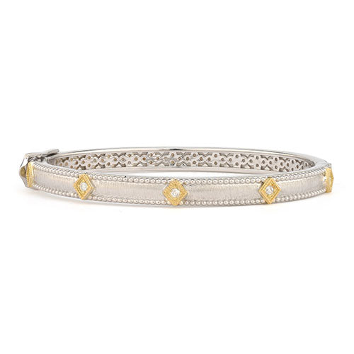 If you are looking for that cool and striking bracelet to enhance your style, this fantastic piece from Jude Francess selection of fine bracelets can be that right piece. From the Mixed Metal Collection, the Mixed Metal Lisse Simple Kite Shaped Bangle with Gold Accents features sterling silver with 18K yellow gold accents and prong set round diamonds with the signature brushed JFJ finish and sterling silver beading.