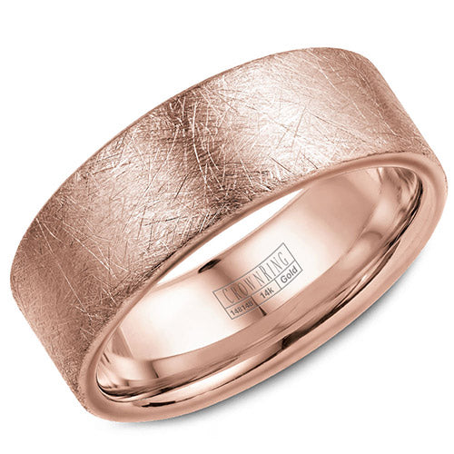 A wedding band in rose gold with a diamond brushed finish.