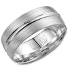 A textured white gold wedding band with line detailing.