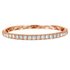 The majestic diamond bangle with superior craftsmanship is sure to be remembered for its striking beauty and design. Simply sophisticated, this bangle bracelet shimmers with round-cut diamonds set in 18K Rose Gold. The diamonds are G-H in color, SI in clarity. 