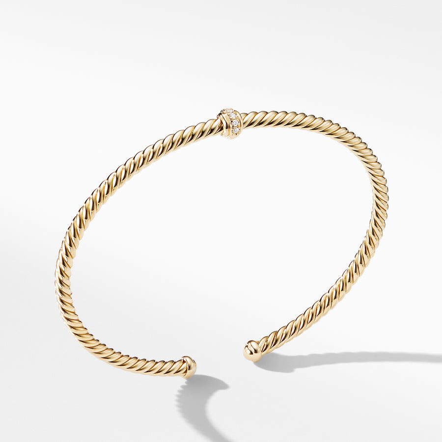 18-karat yellow gold ��� Pav? diamonds, 0.04 total carat weight,  ��� Cable spira bracelet, 3mm wide ��� Flexible design