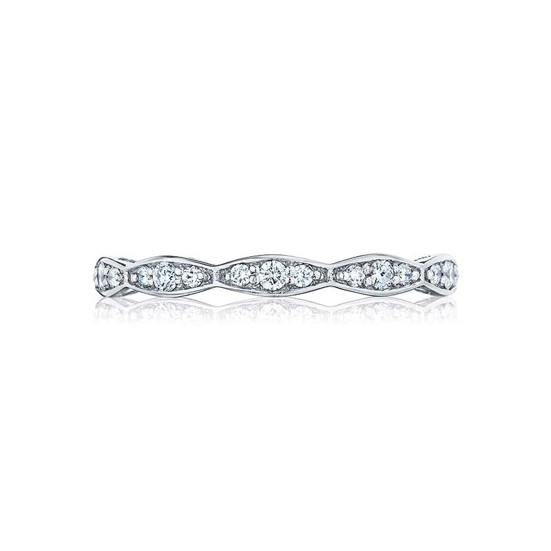 Beautiful marquise shapes give this eternity band a ribbon-like flourish. Brilliant round diamonds sparkle along a stunning diamond and platinum design.Total Carats in wedding ring as pictured equal approximately  0.33Metal Shown: Platinum