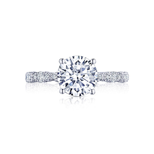 Heralding from the Petite Crescent Collection; this beautiful new style truly allows your round center to stand out. Beautiful marquise shapes with brilliant graduating diamonds dance along this stunning engagement ring. 