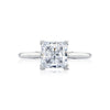 Let your brilliant princess center shine in this timeless engagement ring. A sleek high polished ring with hidden diamond details along the inner face brings your princess center to life.