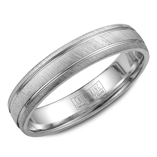A white gold wedding band with a textured center and line detailing.