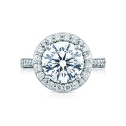 Diamonds from every angle bring your center diamond to life. Graduating pav? set diamonds set _ of the way on a sleek and slim band make way for the grand finale; your round center diamond spotlighted by an intense pav? set diamond bloom. 