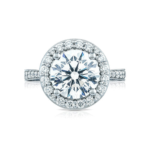 Diamonds from every angle bring your center diamond to life. Graduating pav? set diamonds set _ of the way on a sleek and slim band make way for the grand finale; your round center diamond spotlighted by an intense pav? set diamond bloom. 