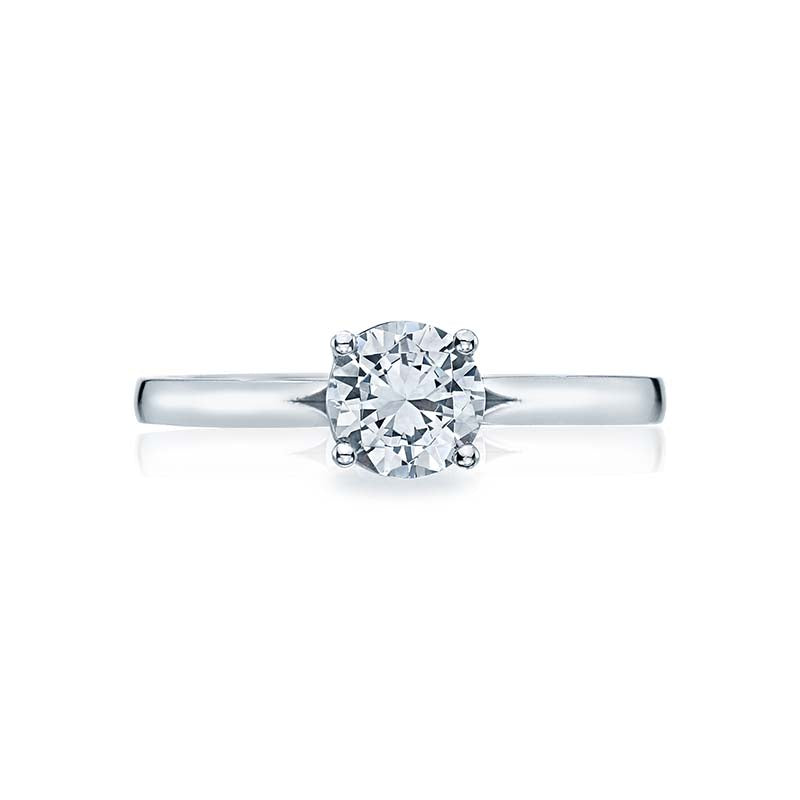 A tapered; split foundation creates a pretty; distinct look on high polished platinum; ready for an elegant round diamond to complete the perfect solitaire.This engagement ring can accommodate a variety of center diamond sizes; starting at 0.5 carats.