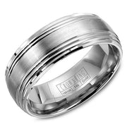 A wedding band in white gold with a brushed center and line detailing.