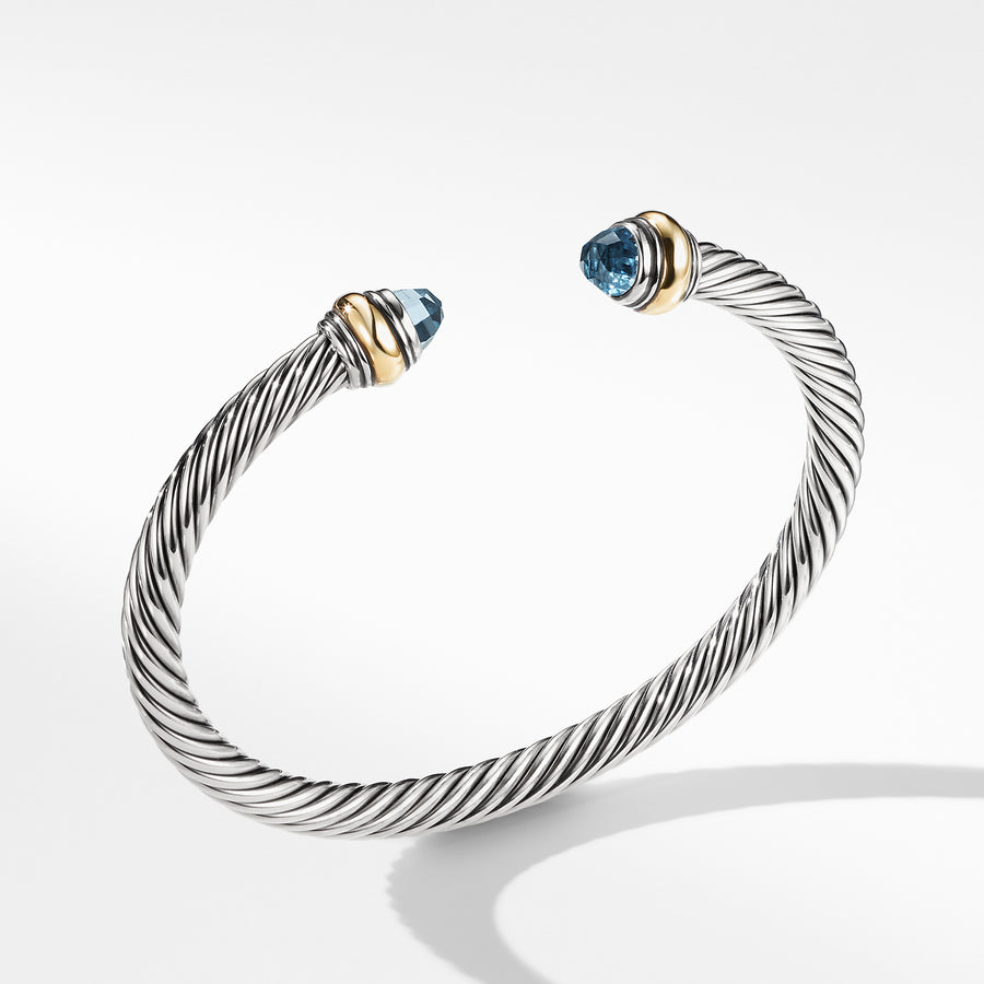 Sterling silver and 14-karat yellow gold ��� Faceted blue topaz,  ��� Cable, 5mm wide