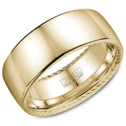 A wedding band in yellow gold with hidden rope detailing.