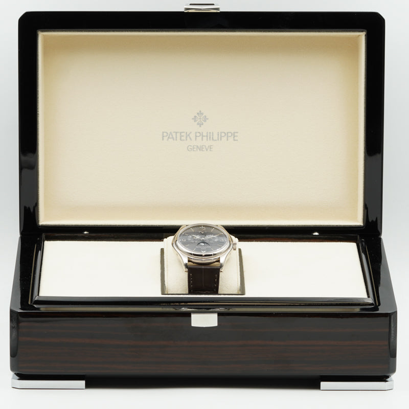 SOLD - Patek Philippe Annual Calendar 5146G-010 39mm 18K White Gold Box and Book