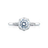 An engagement ring fit for the Tacori Queen. Featuring a renaissance crown; your round center sits on a regal throne for a ring that is worthy of your love story. Brilliant pav ? diamonds dance along the ceiling of the high polished band with hidden diamonds.