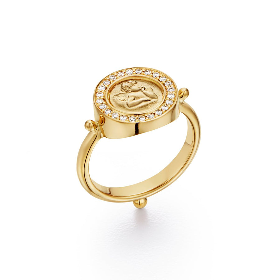 Everyone needs a guardian angel. Modeled after the cherubs in The Sistine Madonna by Renaissance painter Raphael, this classic ring features an angel in golden relief, surrounded by a halo of pave diamonds. One of Temple St. Clairs best sellers!18K Gold 0.21cts of DiamondsWidth: 13mm