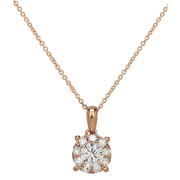 This dazzling rose gold pendant has a larger round brilliant center diamond, and is surrounded by a halo of smaller diamonds. This necklace is a must-have staple for any woman. She can wear it by itself or layer it with other fun yellow gold pendants!