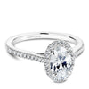 White gold oval halo engagement ring with 44 round diamonds