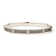 From the JudeFrances Silver Collection, the JudeFrances Silver Lisse Simple Kite Shape Bangle features round faceted white topaz set in sterling silver with black rhodium and the signature brushed JFJ finish and beaded edge.