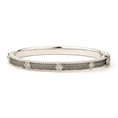 From the JudeFrances Silver Collection, the JudeFrances Silver Lisse Simple Kite Shape Bangle features round faceted white topaz set in sterling silver with black rhodium and the signature brushed JFJ finish and beaded edge.