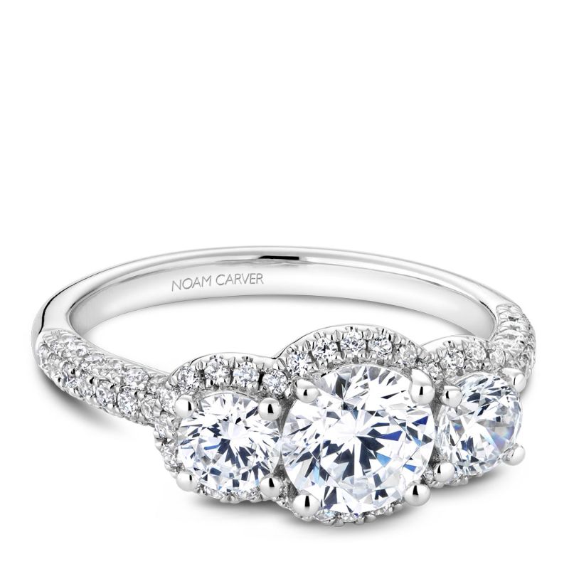 White gold three-stone engagement ring with 100 round diamonds