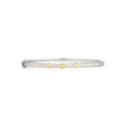 From the Mixed Metal Collection, the Mixed Metal Beaded Trio Bangle features 18k yellow and sterling silver with the signature brushed JFJ finish.Metal	18K Yellow Gold, Sterling SilverWidth	3 mm