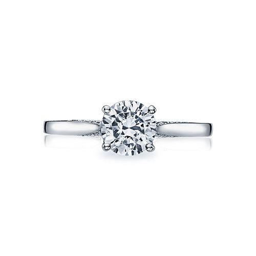 Large crescent motifs give a sweet romance to a solitaire ring; with beautiful diamond accents for special surprise detail from every angle.This engagement ring can accommodate a variety of center diamond sizes; starting at 0.65 carats