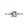 Large crescent motifs give a sweet romance to a solitaire ring; with beautiful diamond accents for special surprise detail from every angle.This engagement ring can accommodate a variety of center diamond sizes; starting at 0.65 carats