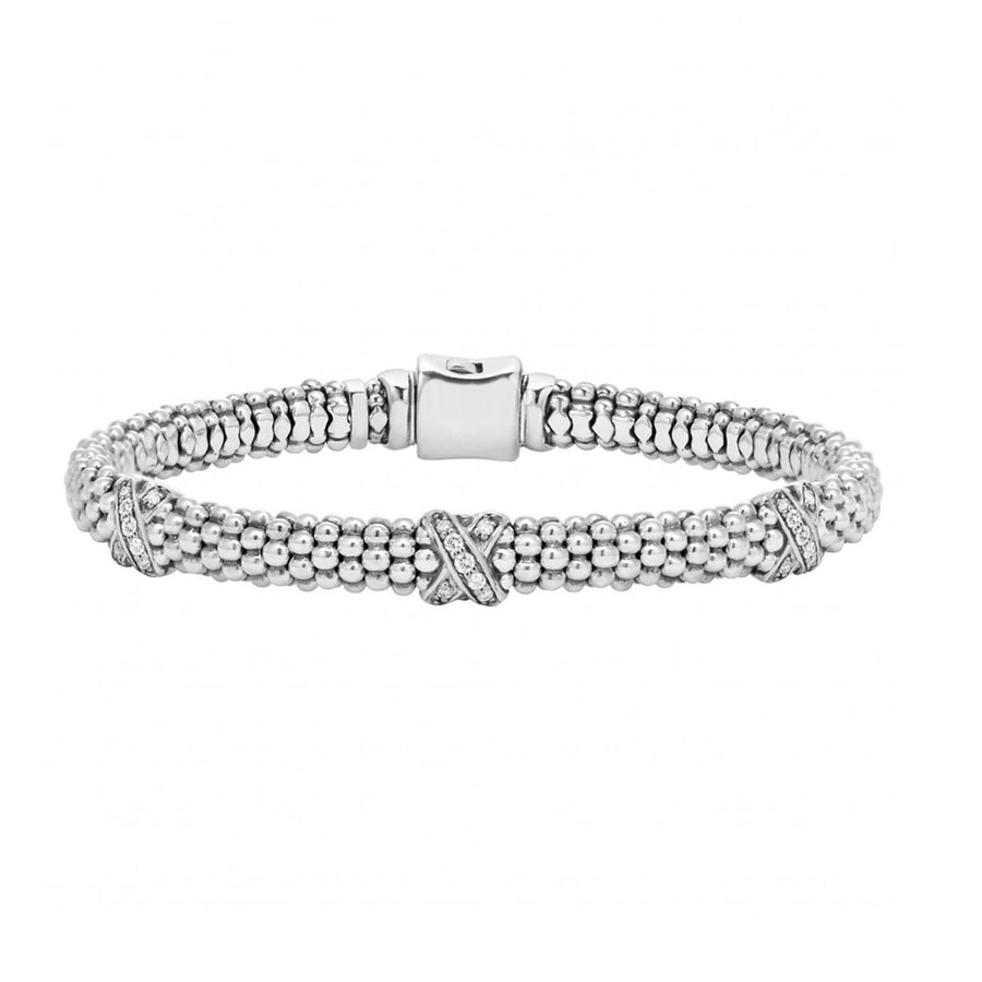 Three pav diamond sterling silver x stations on this classic Caviar beaded bracelet. Finished with a signature box clasp detailing the LAGOS crest. LAGOS diamonds are the highest quality natural stones.- Sterling Silver- 0.21 Carat- Box Clasp- Rope Width 6mm- STYLE #: 05-80790X