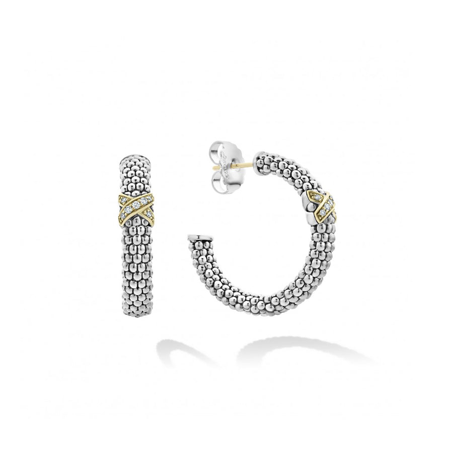 Signature sterling silver Caviar beads accented by a diamond and 18K gold x station on these hoop earrings. Finished with 14K gold posts. LAGOS diamonds are the highest quality natural stones.- Sterling Silver- 0.15 Carat- 14K Gold Post- Dimensions 30mm x 6mm- STYLE #: 01-81023