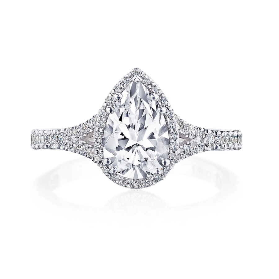 The prettiest new engagement ring from our iconic Dantela collection, the foundation of this ring reaches towards the pear shape center with open arms.Diamond Total Carat Weight (not including center diamond): 0.42ctw*Price varies depending on center stone carat weight.
