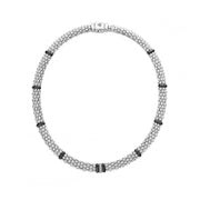 Diamonds set in sterling silver surrounded by ten black ceramic stations with sterling silver Caviar beading. Finished with a sterling silver box clasp. LAGOS diamonds are the highest quality natural stones.- Sterling Silver- 0.11 Carat- Width 9mm- Length 16 Inches- STYLE #: 04-81106-CB16