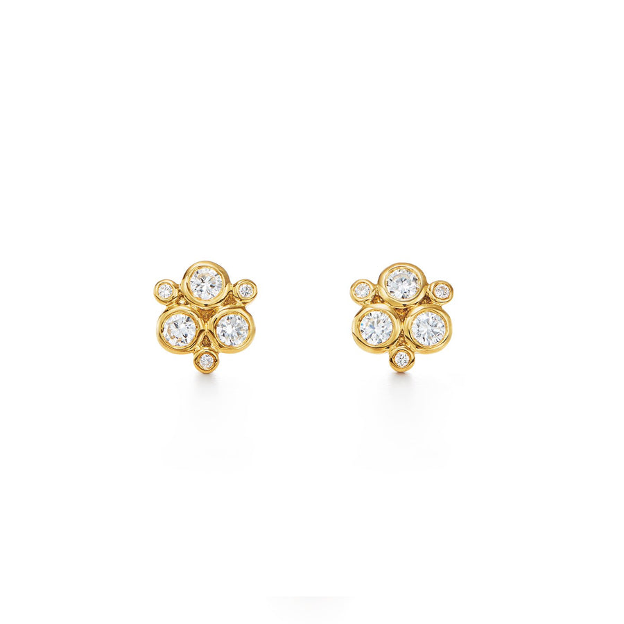 The 18K Classic Trio Diamond Earrings offer a luxurious take on our signature trio motif. Available with a variety of diamond sizes and in either white or yellow gold, these earrings elegantly update the classic stud. One of Temple St. Clairs best sellers!18K GoldPost Back0.47cts of DiamondsAlso available in 1 carat.