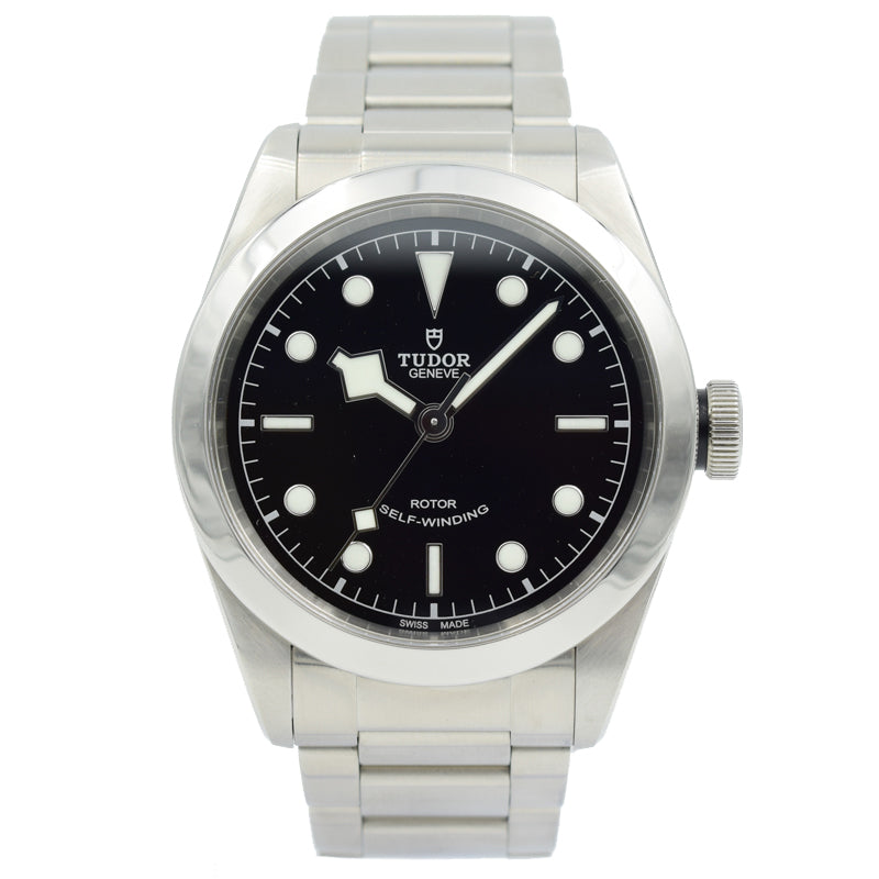 This Tudor Black Bay 41 was recently traded in to our store and is in very good condition! This watch has the full box and papers. The model is in a 41mm stainless steel case on a bracelet with a black dial.
