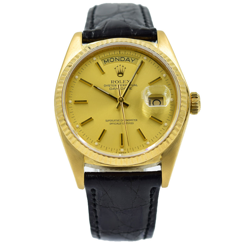 This vintage Rolex President was recently traded in, this will be an excellent Presidential Rolex to pick up for a pre-owned value! This watch features an 18k Yellow Gold case and the day-date movement.  The strap is an aftermarket black alligator strap and buckle since the original gold bracelet was not included. There are some scratches and very minor chips on the edge of the crystal from wear from the previous owner.  This Rolex President is a Day-Date watch is in overall good condition and w