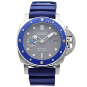 This Panerai Luminor Submersible is in very good condition and comes with the full box and papers. This piece has an open warranty card, but is from late 2019. This piece show no indication of wear from the previous owner. This model is in a 42mm stainless steel case with a blue bezel and grey dial. This piece was sold in December 2019.
