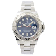 This Rolex Yachtmaster 126622 was recently traded in to our store and is in excellent condition. This watch comes with the full box and papers. This model is in a 40mm stainless steel case with a platinum bezel. It features a blue dial with red accents.