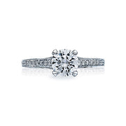 For the modern Tacori Girl; this stunning solitaire with a single string of diamonds glistening along the crisp platinum ceiling makes for a truly one of a kind engagement ring. A brilliant round center diamond is placed on the crown with grace and crafts