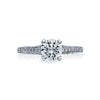 For the modern Tacori Girl; this stunning solitaire with a single string of diamonds glistening along the crisp platinum ceiling makes for a truly one of a kind engagement ring. A brilliant round center diamond is placed on the crown with grace and crafts