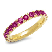 The ideal gift for those born in July, or those who like a bold and flirty color in a refined silhouette. The Large Ruby Eternity Band looks beautiful worn next to the Large Blue Sapphire Eternity Band, the Large Emerald Eternity Band, and the Large Pink Sapphire Eternity Band. It weighs 1.70 carats and is 2.5mm thick.